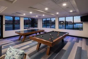 recreation room with ping pong table and pool table