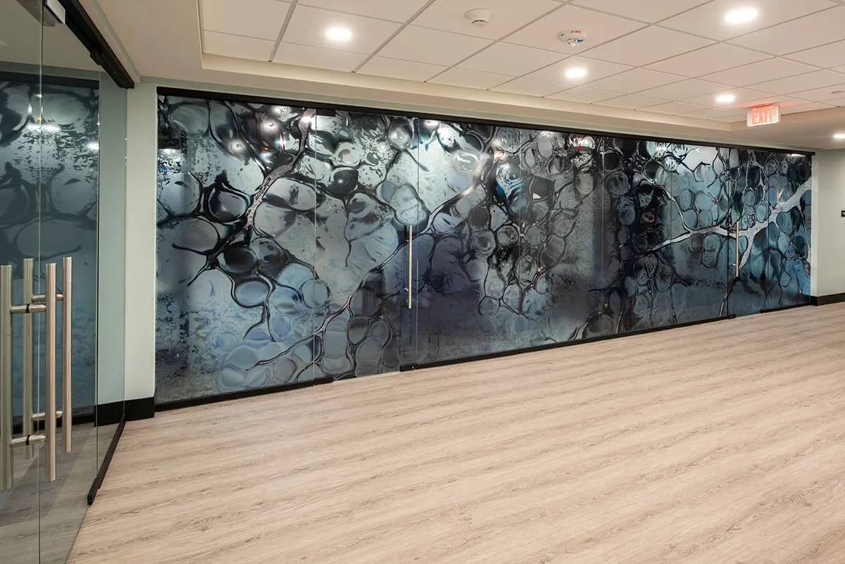 wall with doors with abstract mural on them