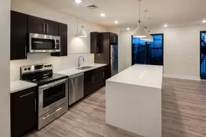 apartment kitchen with large white island