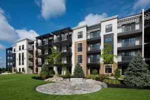 4 story apartment building with patios