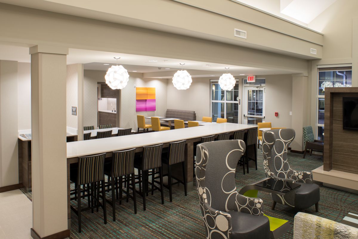 Residence Inn by Marriott common area seating with long table