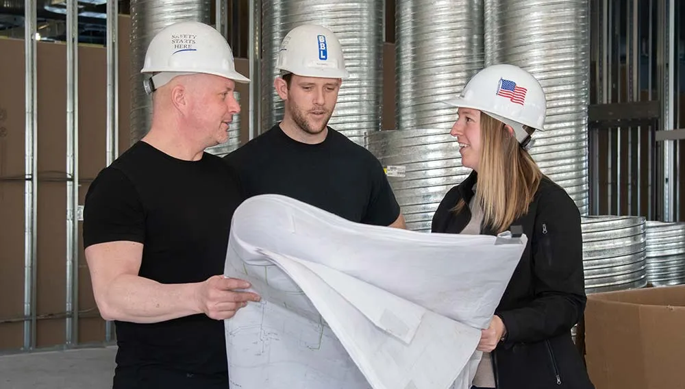employees in hard hats
