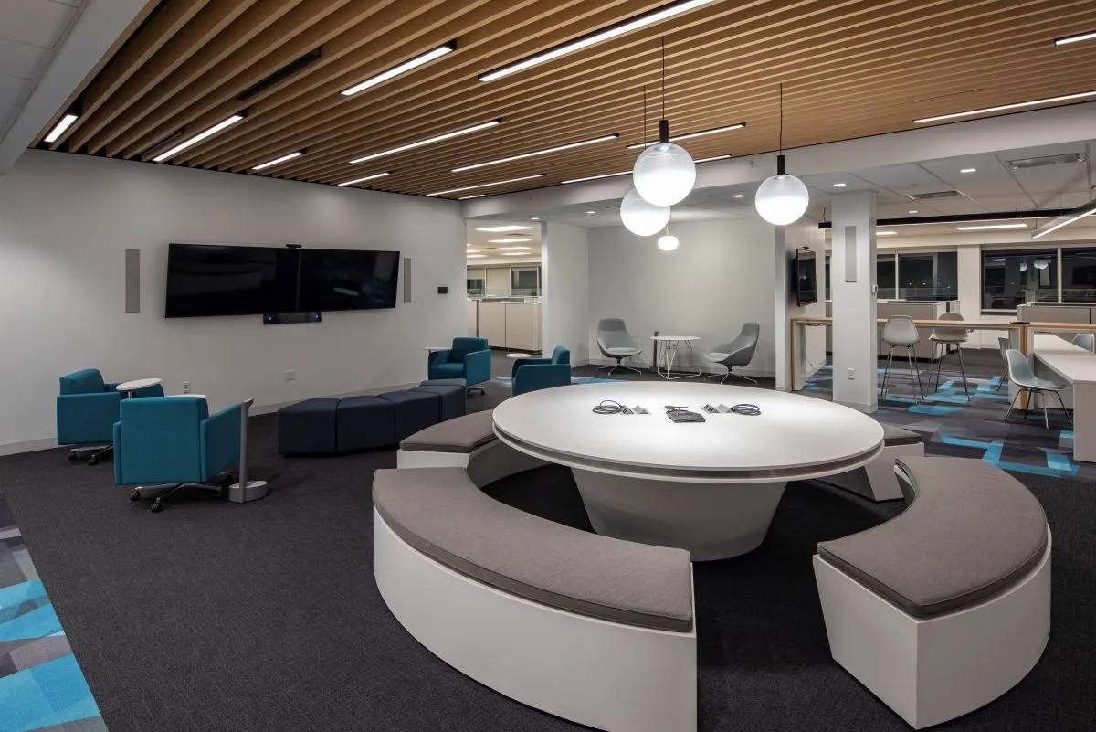 Plug Power office common area with round table and seating