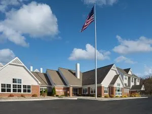 Residence Inn exterior with large American flag in front